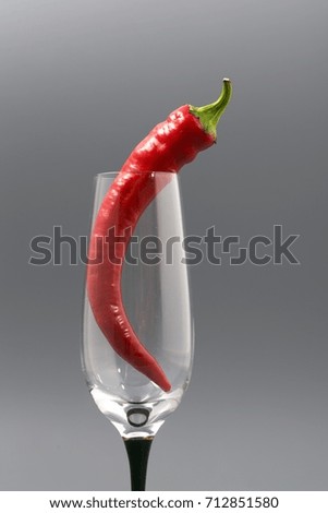 red hot pepper on a gray background