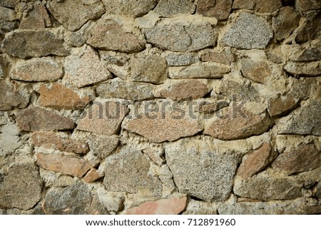 Old stone masonry of stones of different size and shape