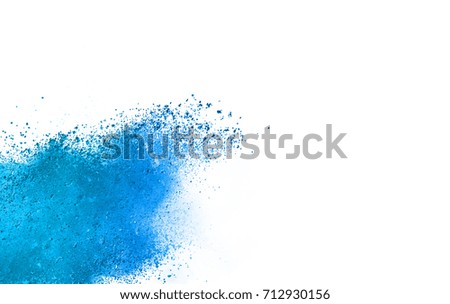 Powder explosion on white background. Colored blue cloud. Colorful dust explode. Paint Holi festival.