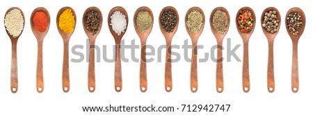 Set of spoons with different spices  isolated on white, top view, high resolution Royalty-Free Stock Photo #712942747