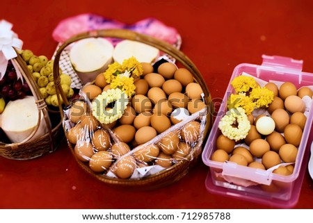 Thai traditional culture. Boiled eggs and other things for Buddha warship. This image was blurred or selective focus.  Royalty-Free Stock Photo #712985788