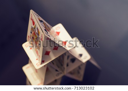 Pyramid playing cards (high view, soft focus)