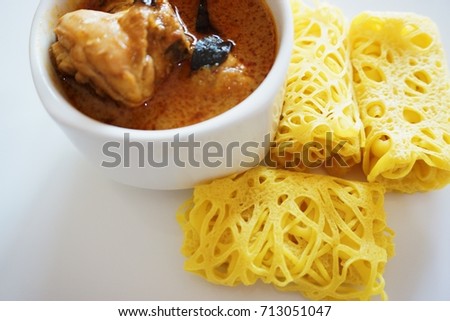 A closed up picture of a traditional dish among malaysians called net pancake. Commonly served with lamb or chicken curry and it is so delicious. It is also called "Roti Jala" among Malaysians.