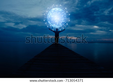 Abstract science, circle global network connection in hands on night sky background / soft focus picture / Blue tone concept Royalty-Free Stock Photo #713054371