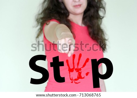 stop concept. Photo for your design with text. attractive girl shows thumb forward