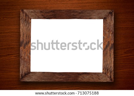 Close up brown wooden picture frame with space use for texts or products display