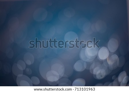 Dark blue is bokeh Background. The background with bokeh. Abstract texture. Color circles. Blurred.