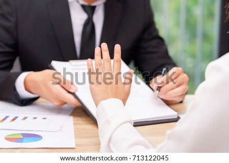 Customer or woman says no or hold on when businessman giving pen for signing a contract. Royalty-Free Stock Photo #713122045