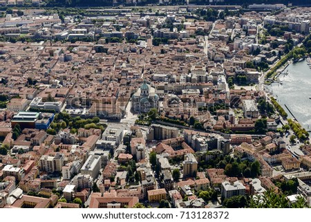 aerial view of old town center from Brunate hill, shot in bright summer light at Como,  Lombardy, Italy

