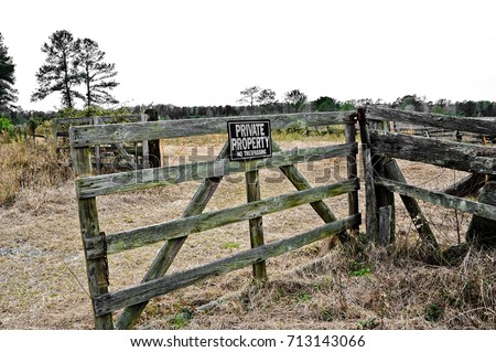 Old Wooden Gate on a Farm with a Private Property Sign 