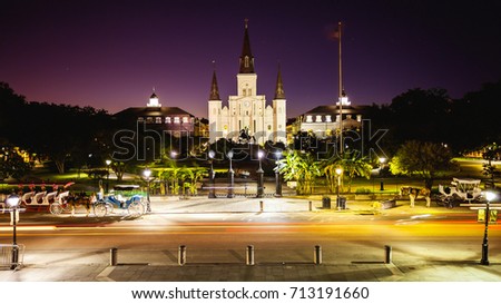 St Louis Cathedral and Jackson Square in New Orleans French Quarter as night falls in Louisiana