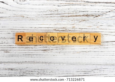 Recovery word made with wooden blocks concept