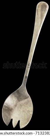 Old Patinated Stainless Steel Salad Fork Isolated On Black Background