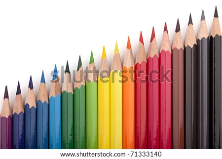 Different colored pencils in a formation.