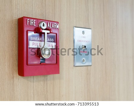 fire alarm box with fire fighters telephone on wall for warning and security system