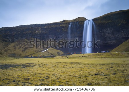 Seljalandsfoss one of the most famous Icelandic waterfall. Slow shutter image