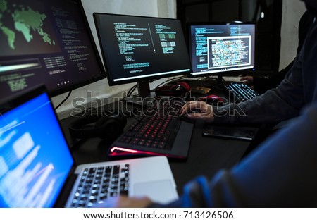 Hacker working on computer cyber crime Royalty-Free Stock Photo #713426506