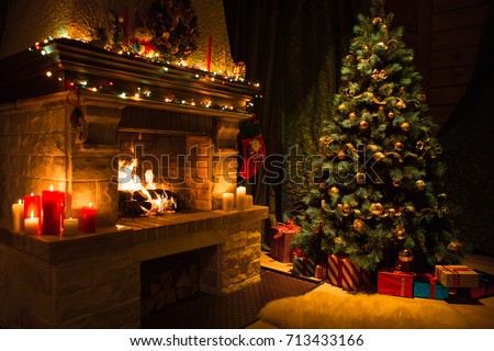 Living room home interior with decorated fireplace and christmas tree