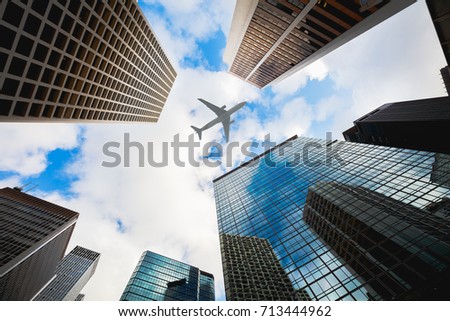 Modern buildings in central Hong Kong with airplane in the sky, Hong Kong