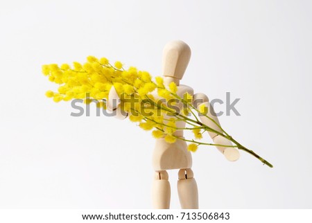 Dummy in love, offering flowers