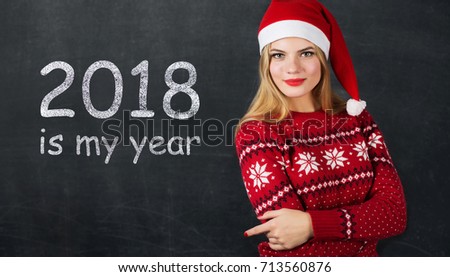2018 is my year on black chalk board and the beautiful girl in the Santa Clause hat