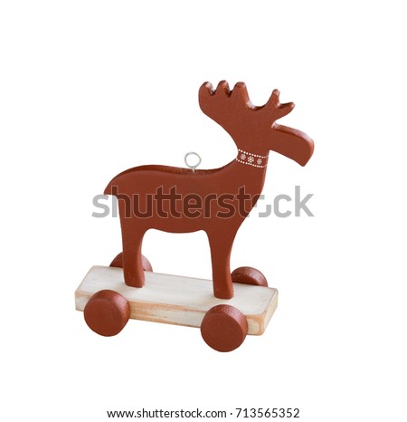 Decorative wooden Christmas elk toy isolated on white. Handmade christmas ornament.