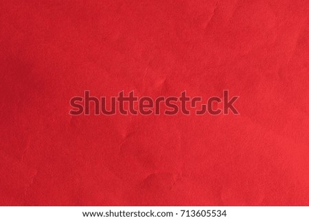 Close-up of dark red paper texture background