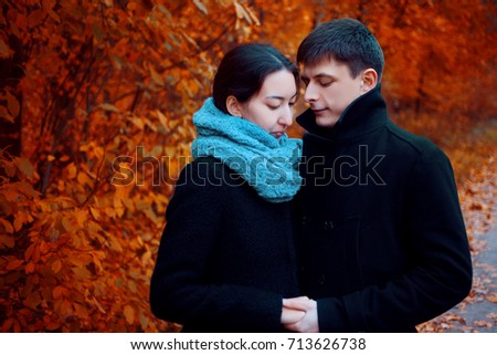 Multi-ethnic couple. Handsome young people. Portrait outdoors