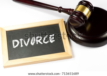 A gavel and a chalkboard with the word divorce
