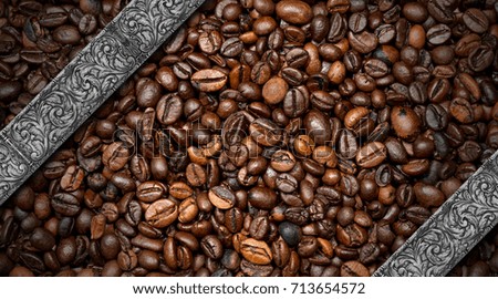 Vintage template with roasted coffee beans and two diagonal silver bands