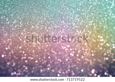 colorful green pink purple and blue bokeh light glitter soft tone background for Christmas and New Year's day
