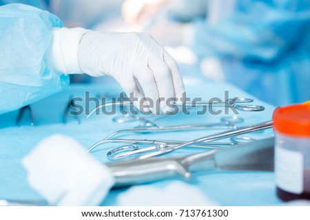 Close up of female hand that holding instrument Royalty-Free Stock Photo #713761300