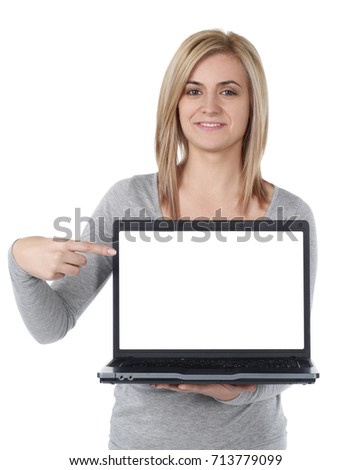 Cheerful girl showing laptop screen