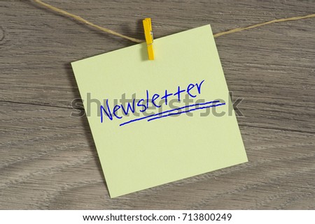 A note with the word newsletter