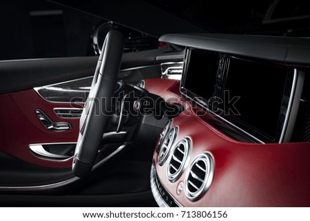 Modern race car dashboard red leather interior