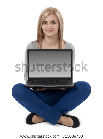 Cheerful girl with laptop