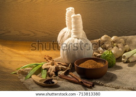 Thai herbs and spa massage, Nature medicine, Herbals ingredient such as cinnamon stick, turmeric, bergamot and dried mangosteen powder. Royalty-Free Stock Photo #713813380