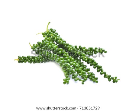 young pepper corn on white background