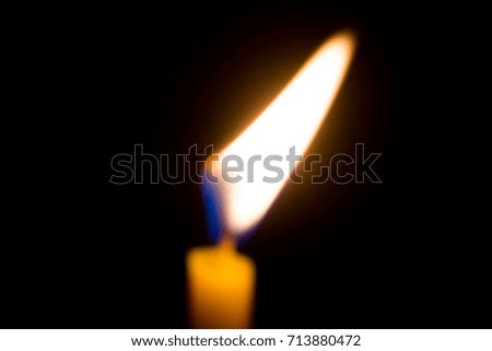 Candle flame in the dark