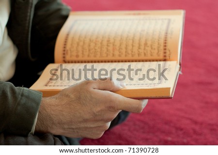 Man reading the holy quran
