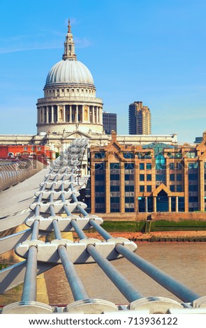 London, river Thames, Millennium bridge and St. Paul on a bright sunny day, toned image