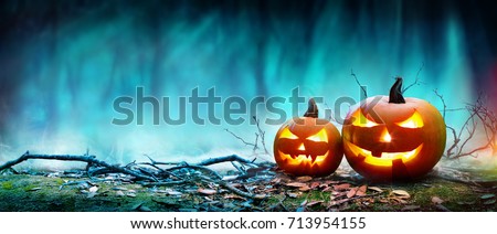 Jack O’ Lanterns Glowing At Moonlight In The Spooky Night - Halloween Scene
