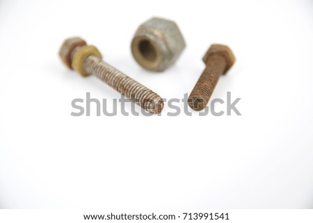 old nuts and bolts on a white background with space for text
