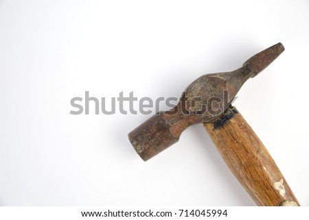 rusty old hammer isolated on a white background