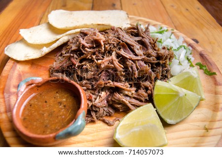 Slow cooker traditional mexican lamb barbacoa Royalty-Free Stock Photo #714057073