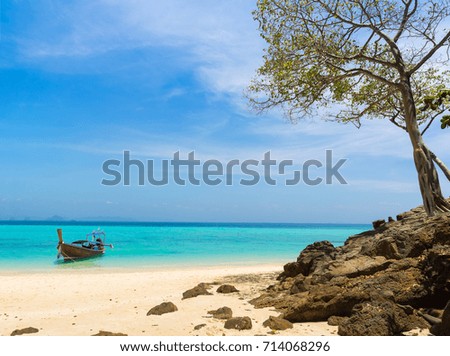 Amazing view of beautiful beach on the island with longtale boat. Location: Krabi Province, Thailand, Andaman Sea. Artistic picture. Beauty world.