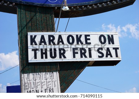 Sign advertising karaoke nights              
