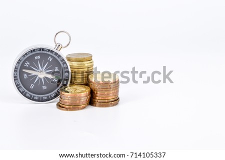  Financial concept - navigating in difficult times with stacking coins on white background.Selective focus.