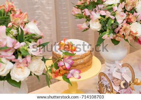 Horizontal picture of delicious cake made with milk candy for woman party