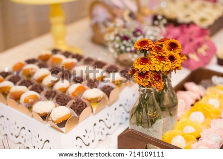Horizontal picture of flowers inside the bottle to ornate woman party table.